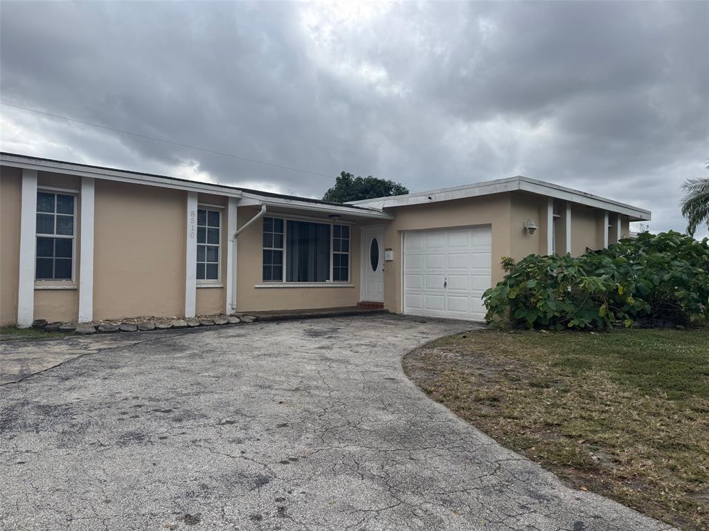 a view of outdoor space yard and garage