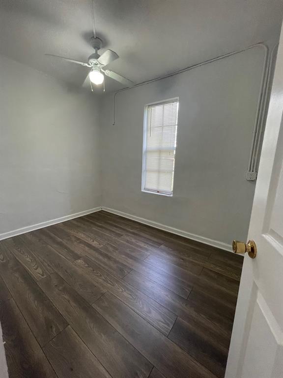 8510 Sunset Strip Sunrise, FL 33322 - Photo 17 of 21 wooden floor in an empty room with a window
