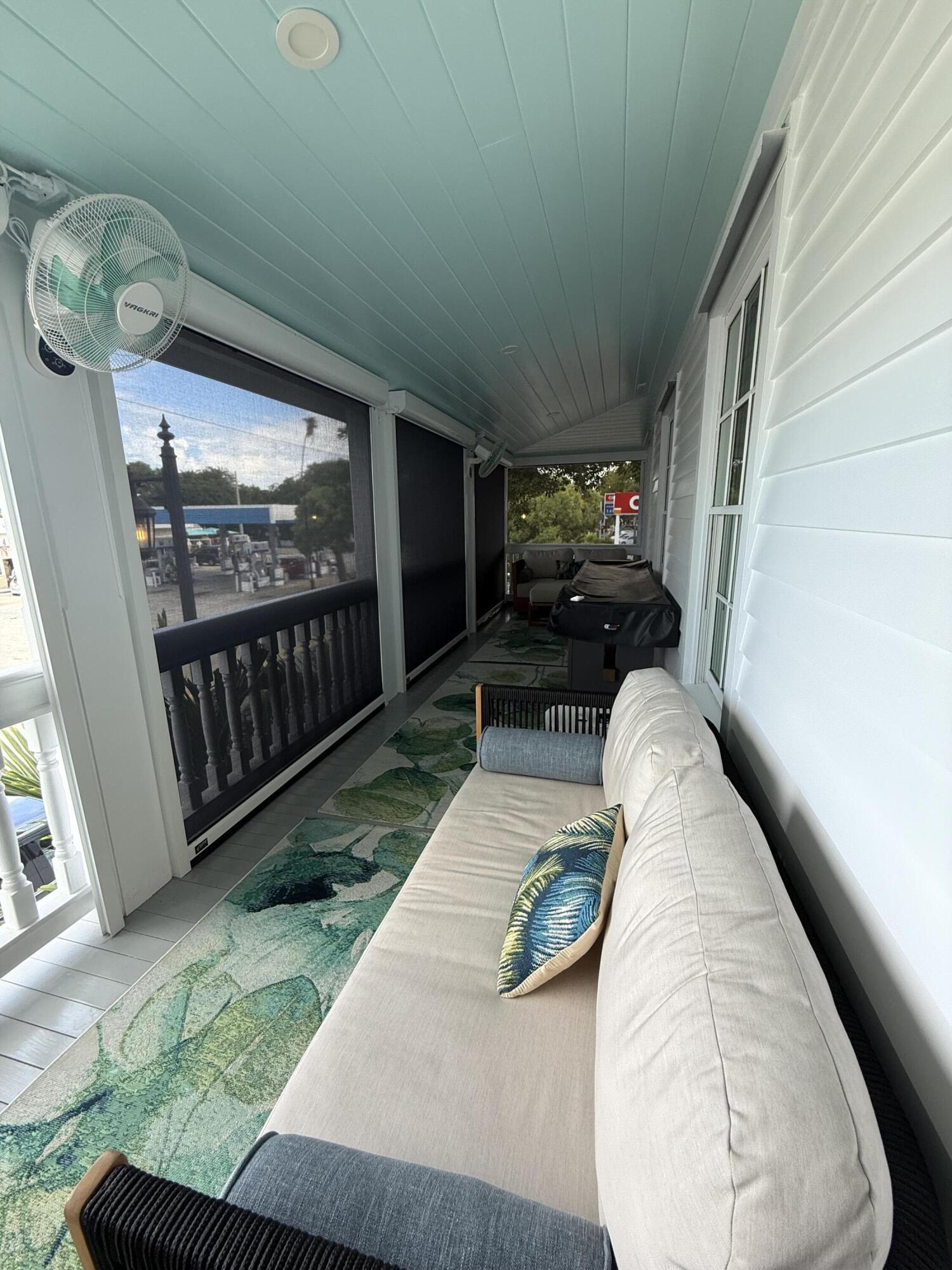 1116 Truman Avenue, Unit 1 Key West, FL 33040 - Photo 15 of 18 a living room with furniture