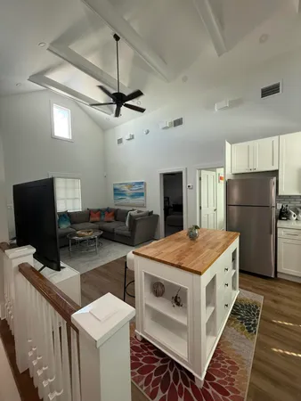 a kitchen that has a cabinets and a stove