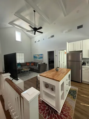 a kitchen that has a cabinets and a stove