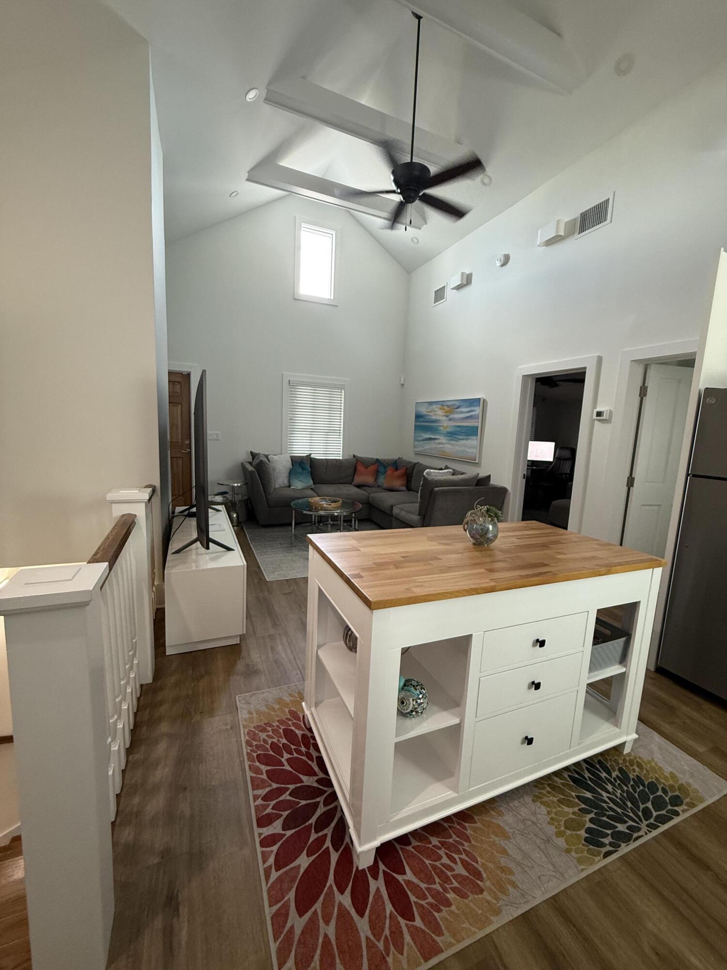 1116 Truman Avenue, Unit 1 Key West, FL 33040 - Photo 6 of 18 a kitchen with a stove and a sink