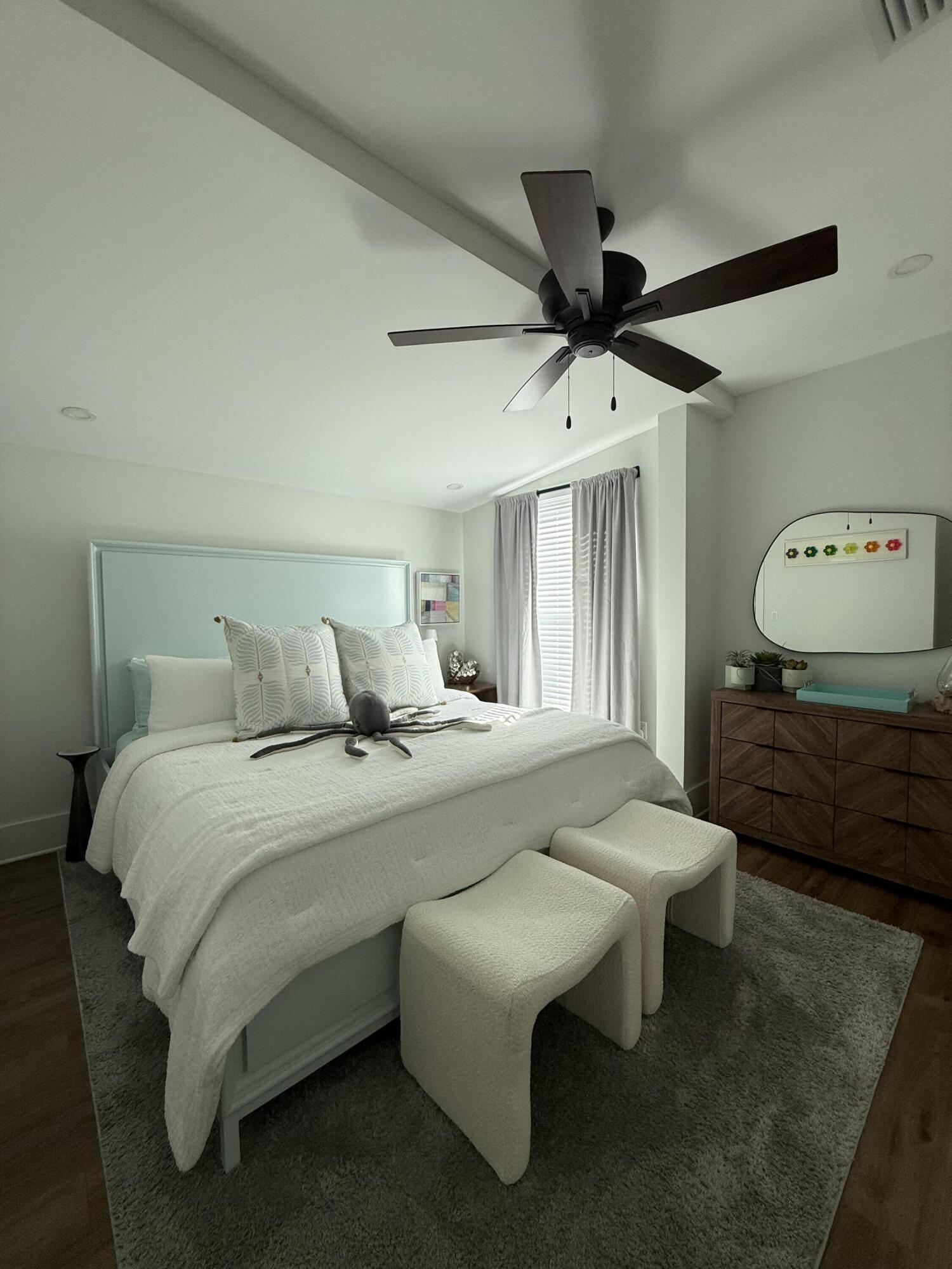 1116 Truman Avenue, Unit 1 Key West, FL 33040 - Photo 10 of 18 a bed room with a bed and a chandelier