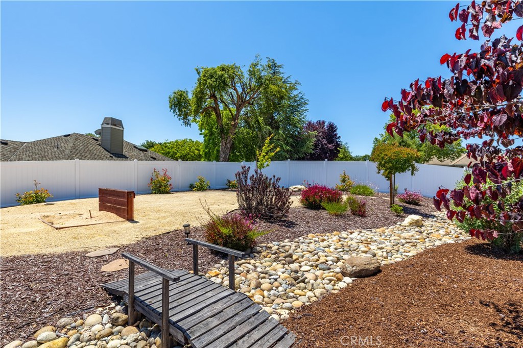 1275 Shane Lane Templeton, CA 93465 - Photo 49 of 70 a view of a terrace with a table and chairs and potted plants