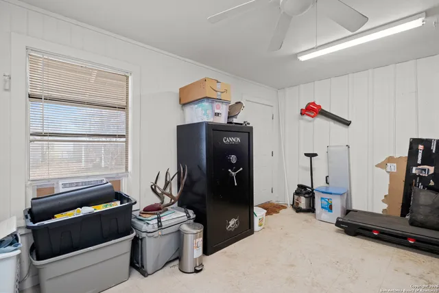 a view of a hallway with bathroom