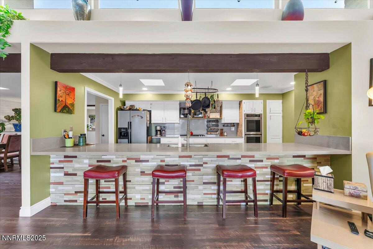 3415 Skyline Boulevard Reno, NV 89509 - Photo 13 of 49 a dinning table and chairs in a room