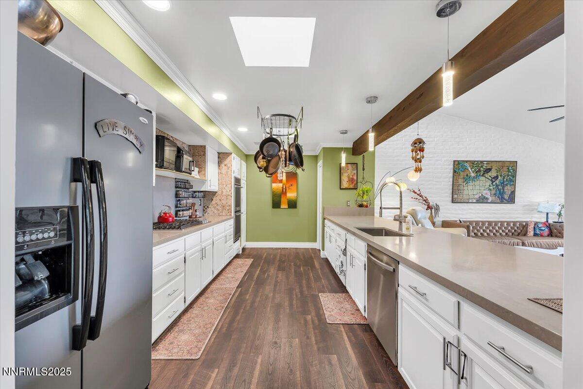 3415 Skyline Boulevard Reno, NV 89509 - Photo 16 of 49 a large kitchen with stainless steel appliances granite countertop lots of counter top space