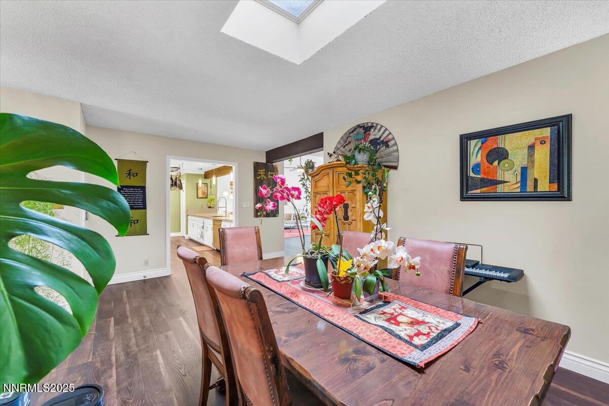 3415 Skyline Boulevard Reno, NV 89509 - Photo 22 of 49 a living room with furniture and flowers