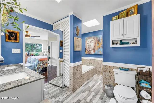 a bathroom with a bathtub and shower