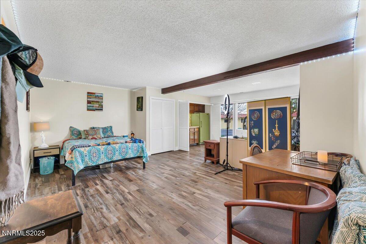3415 Skyline Boulevard Reno, NV 89509 - Photo 29 of 49 a living room with furniture and wooden floor
