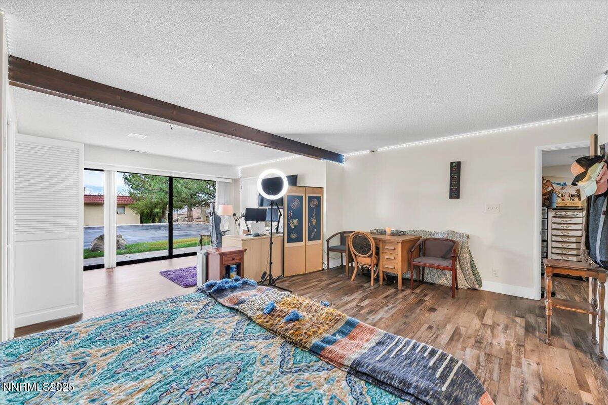 3415 Skyline Boulevard Reno, NV 89509 - Photo 30 of 49 a living room with furniture and a wooden floor
