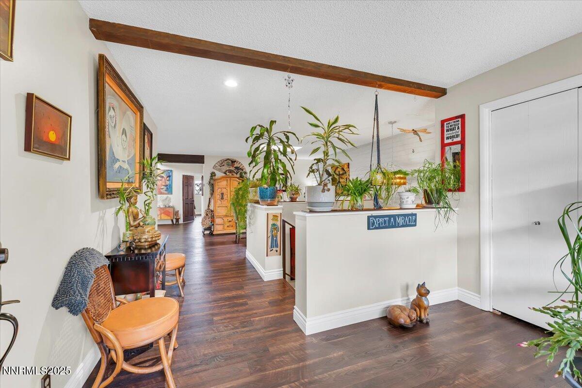 3415 Skyline Boulevard Reno, NV 89509 - Photo 3 of 49 a living room with furniture and a potted plant