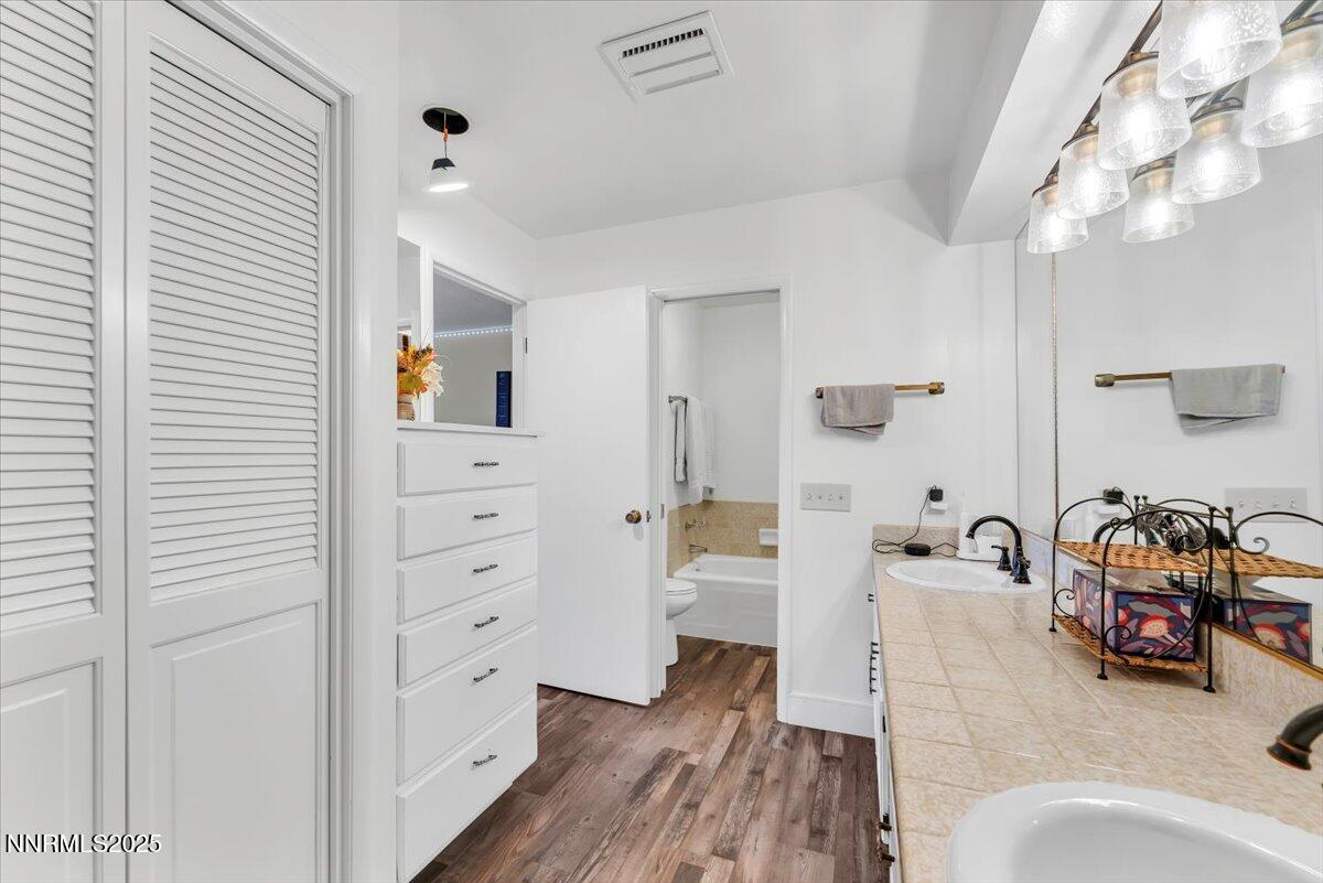 3415 Skyline Boulevard Reno, NV 89509 - Photo 36 of 49 a view of a bedroom with furniture and natural light