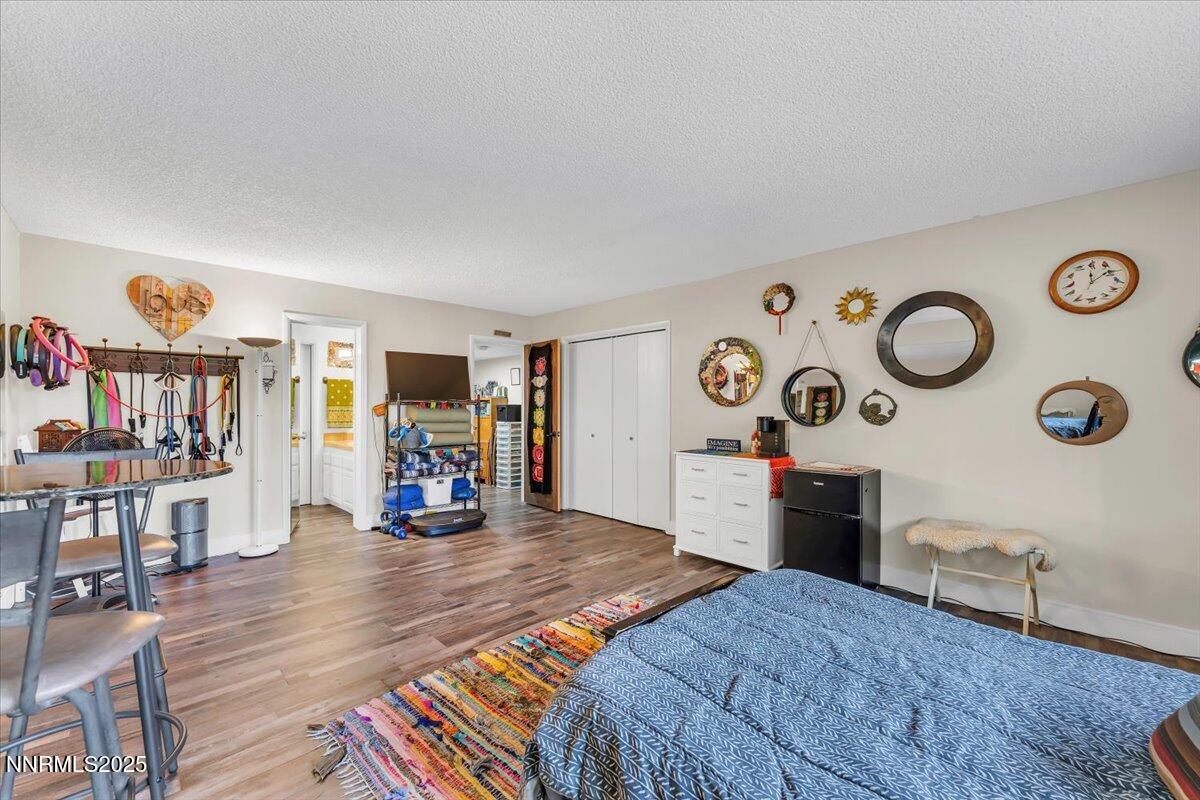 3415 Skyline Boulevard Reno, NV 89509 - Photo 39 of 49 a living room with furniture and wooden floor