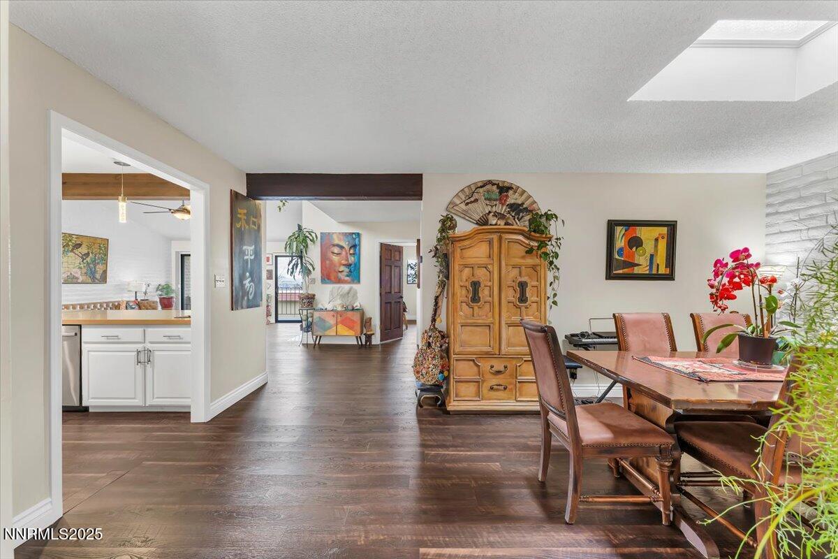 3415 Skyline Boulevard Reno, NV 89509 - Photo 4 of 49 a dining room with furniture and wooden floor