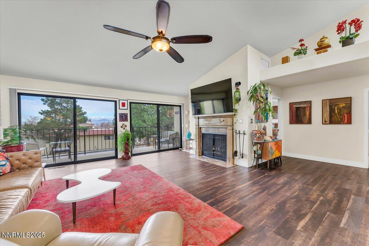 3415 Skyline Boulevard Reno, NV 89509 - Photo 8 of 49 a living room with furniture and a fireplace