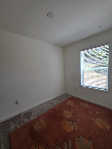 a bathroom with a double vanity sink toilet and shower