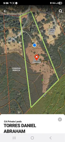 a view of an ocean beach and mountain