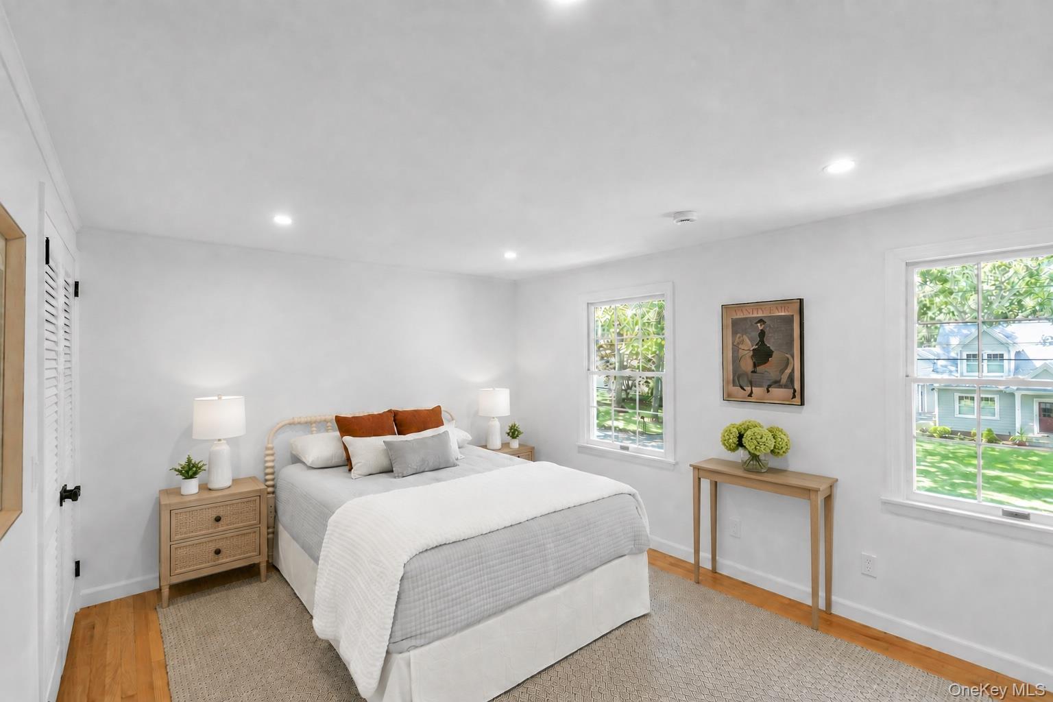 275 Pinewood Road Cutchogue, NY 11935 - Photo 24 of 45 Recessed lighting, wood-finish flooring, and white walls