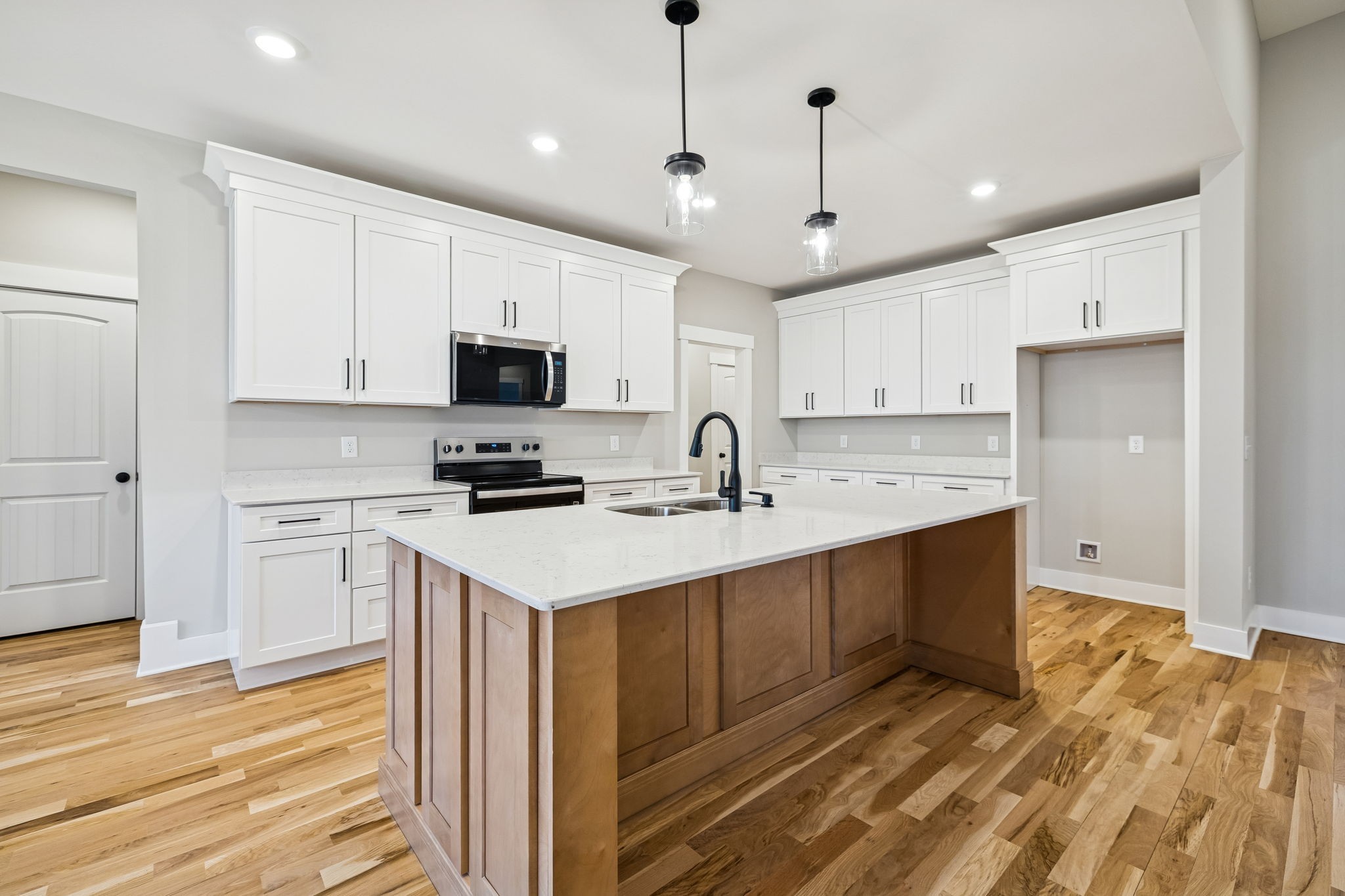 1183 Hangar Road Springfield, TN 37172 - Photo 12 of 69 a kitchen with stainless steel appliances granite countertop a sink and a stove
