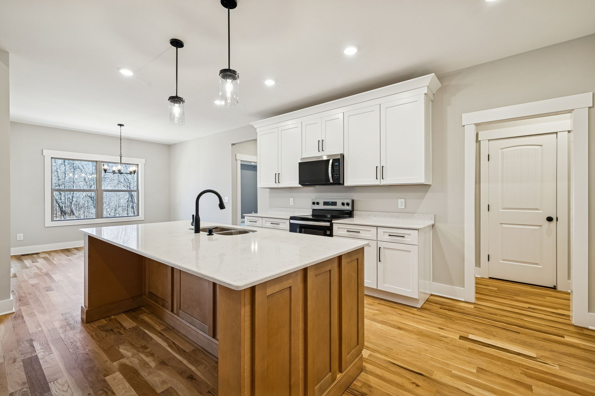 1183 Hangar Road Springfield, TN 37172 - Photo 14 of 69 a kitchen with kitchen island a sink appliances and cabinets