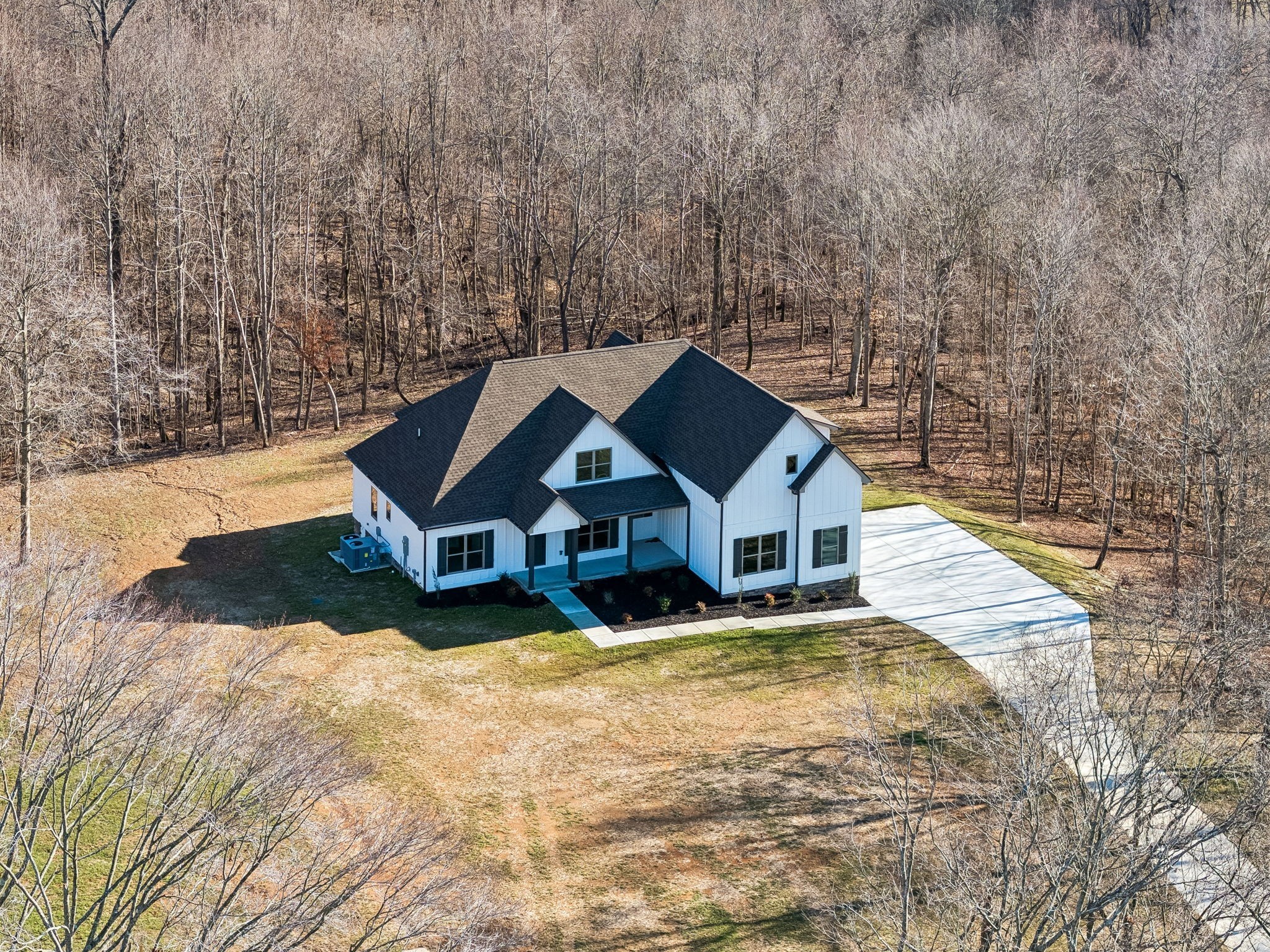 1183 Hangar Road Springfield, TN 37172 - Photo 2 of 69 a view of a house with a yard and large trees
