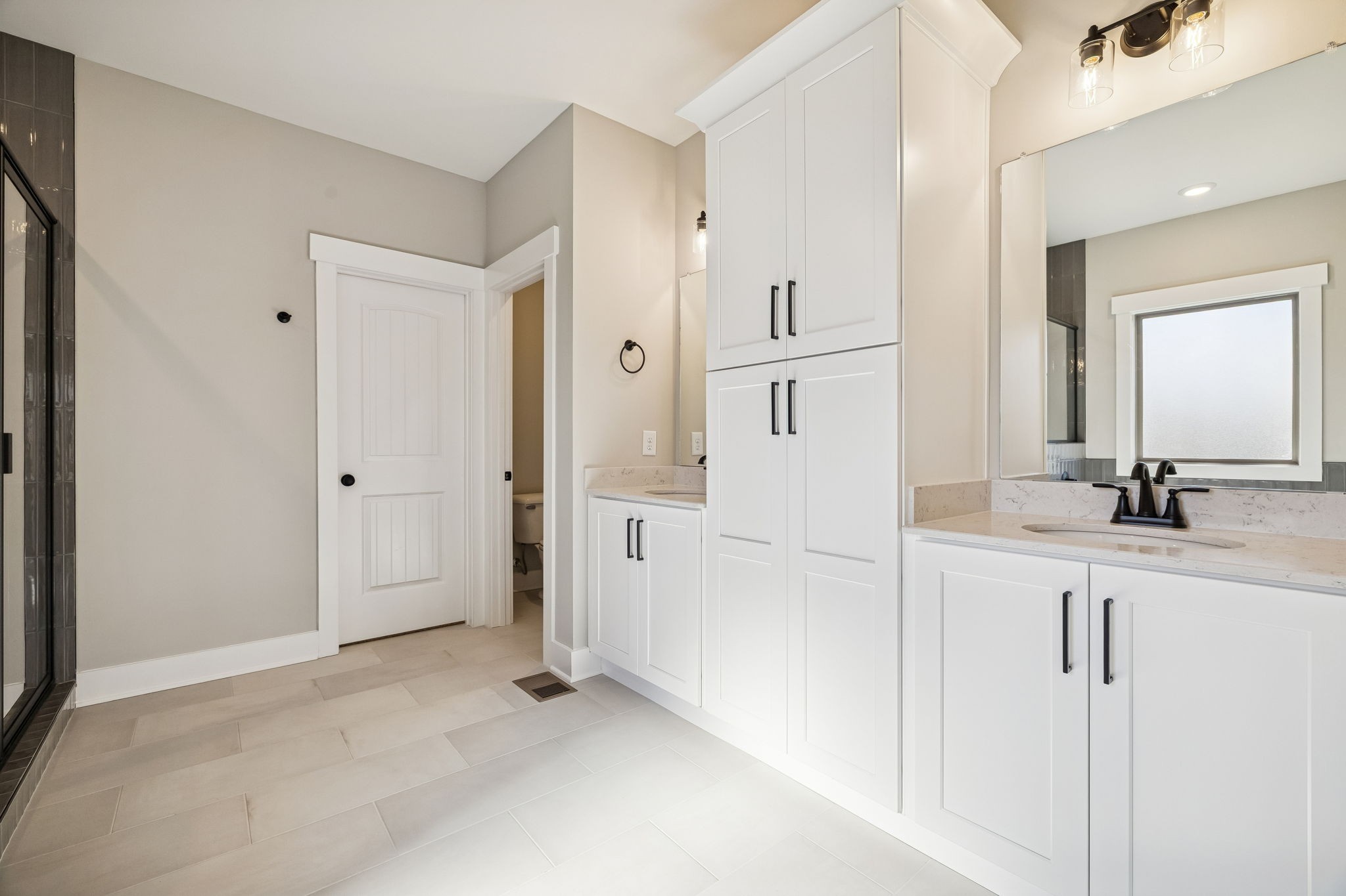 1183 Hangar Road Springfield, TN 37172 - Photo 32 of 69 a view of a bathroom with a sink mirror and shower