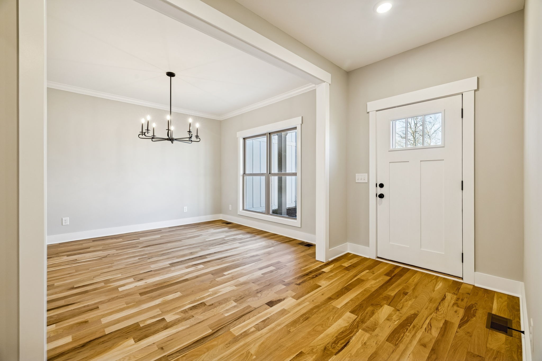 1183 Hangar Road Springfield, TN 37172 - Photo 7 of 69 a view of empty room with window and wooden floor