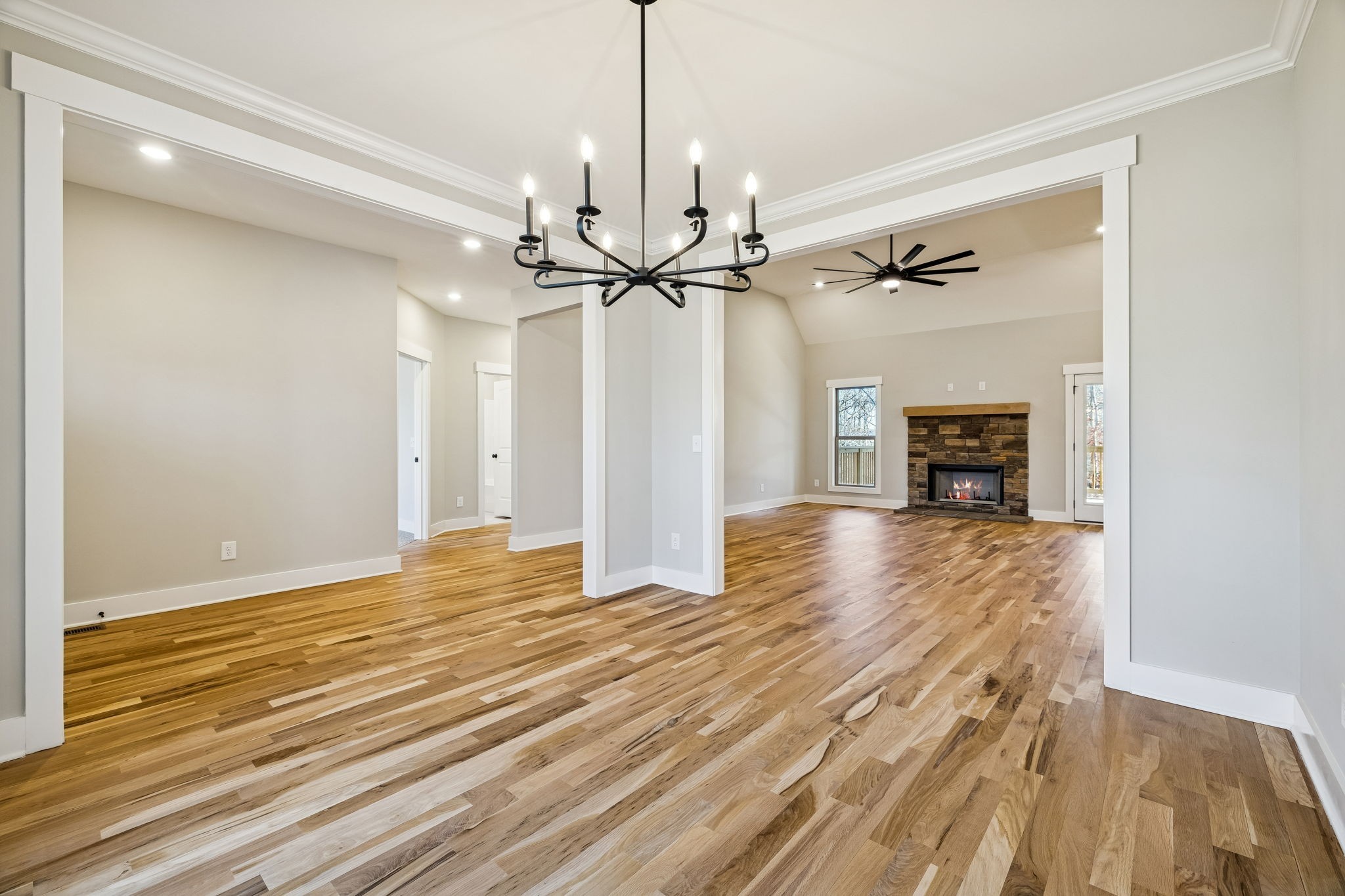 1183 Hangar Road Springfield, TN 37172 - Photo 10 of 69 a view of empty room with a fireplace and wooden floor