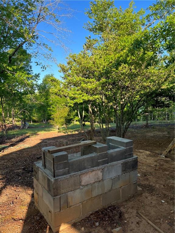 271 Pebble Hill Road Southeast Milledgeville, GA 31061 - Photo 6 of 8 a view of fountain in a yard