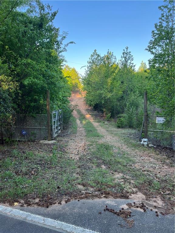271 Pebble Hill Road Southeast Milledgeville, GA 31061 - Photo 7 of 8 a view of a yard with a tree