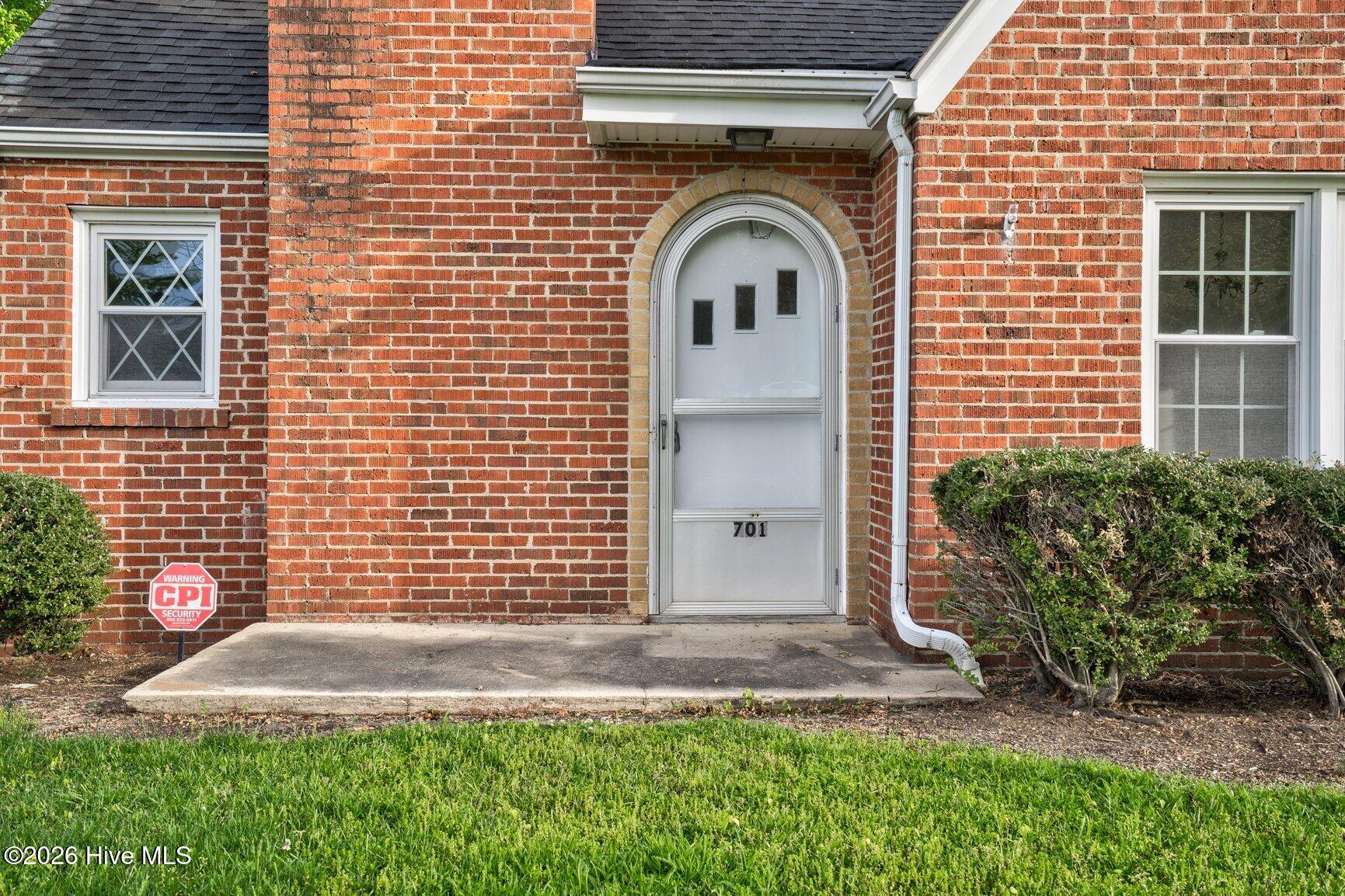 701 East Nash Street Spring Hope, NC 27882 - Photo 2 of 34 Front Porch Arched Entrance