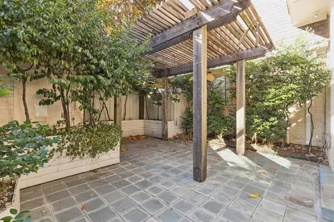 a backyard of a house with lots of green space