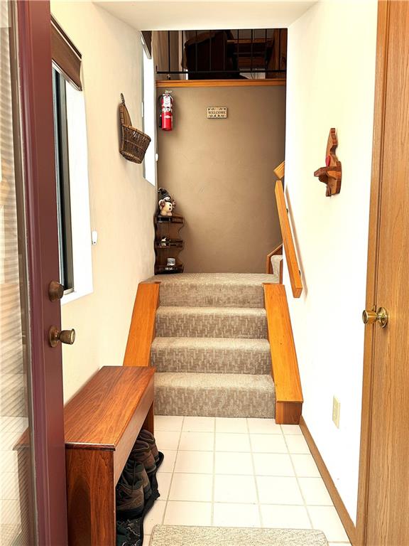 Z1 Sunridge Road Champion, PA 15622 - Photo 4 of 18 a view of staircase with white walls and a window