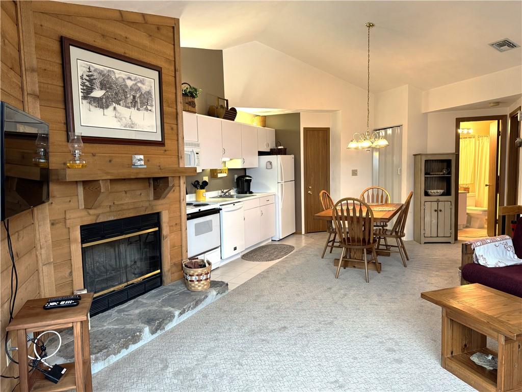 Z1 Sunridge Road Champion, PA 15622 - Photo 7 of 18 a living room with furniture a fireplace and kitchen view
