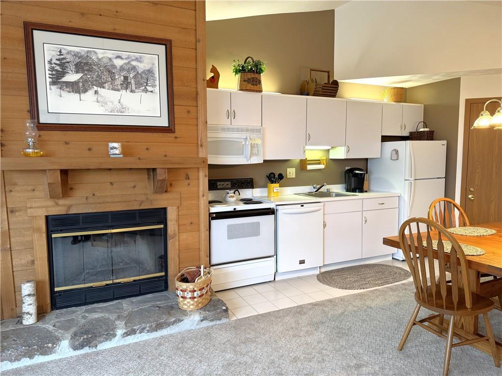 Z1 Sunridge Road Champion, PA 15622 - Photo 10 of 18 a kitchen with stainless steel appliances a stove a refrigerator sink and cabinets