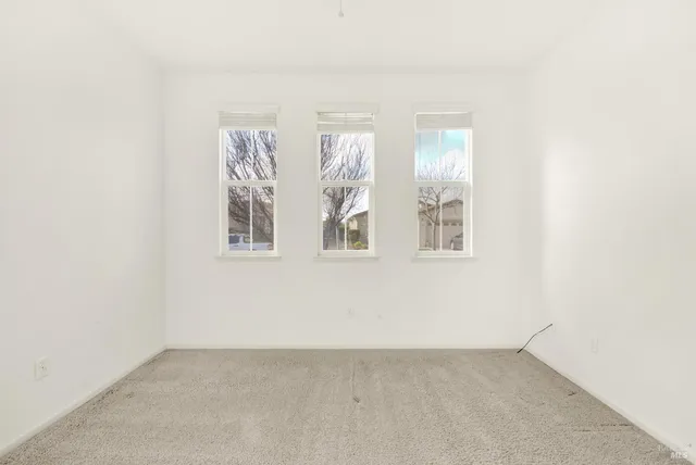 a bathroom with a sink a toilet a mirror and bathtub