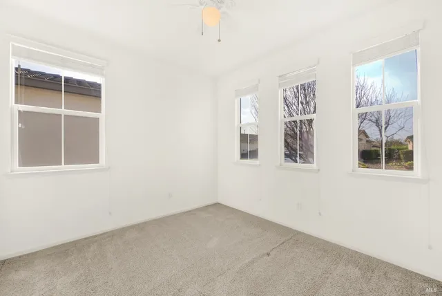 a en suite bathroom with a sink and a mirror