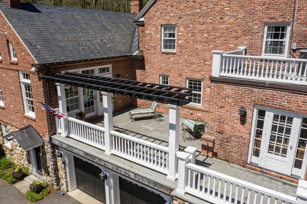 116 Meadowbrook Road Weston, MA 02493 - Photo 23 of 26 front view of a house with a door