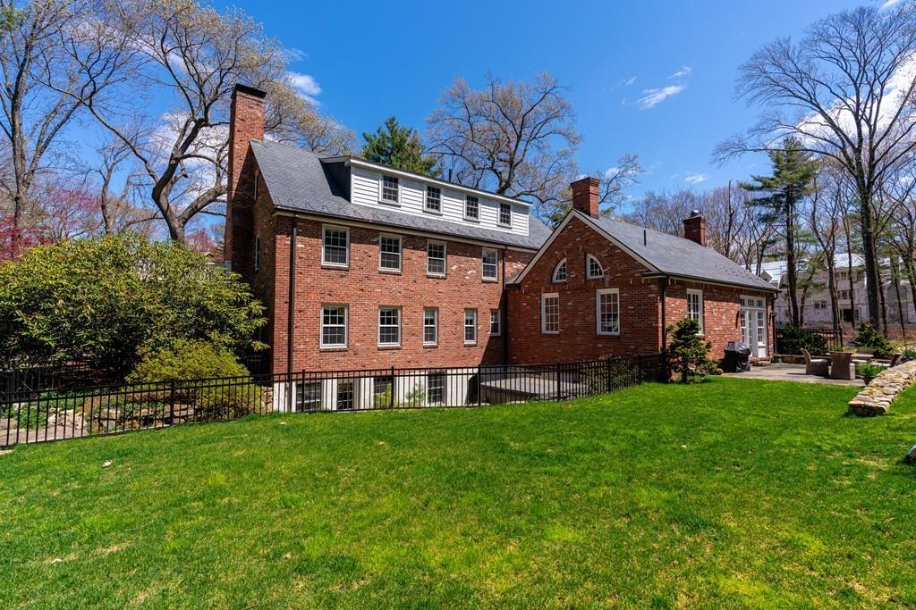116 Meadowbrook Road Weston, MA 02493 - Photo 26 of 26 a front view of a house with a yard