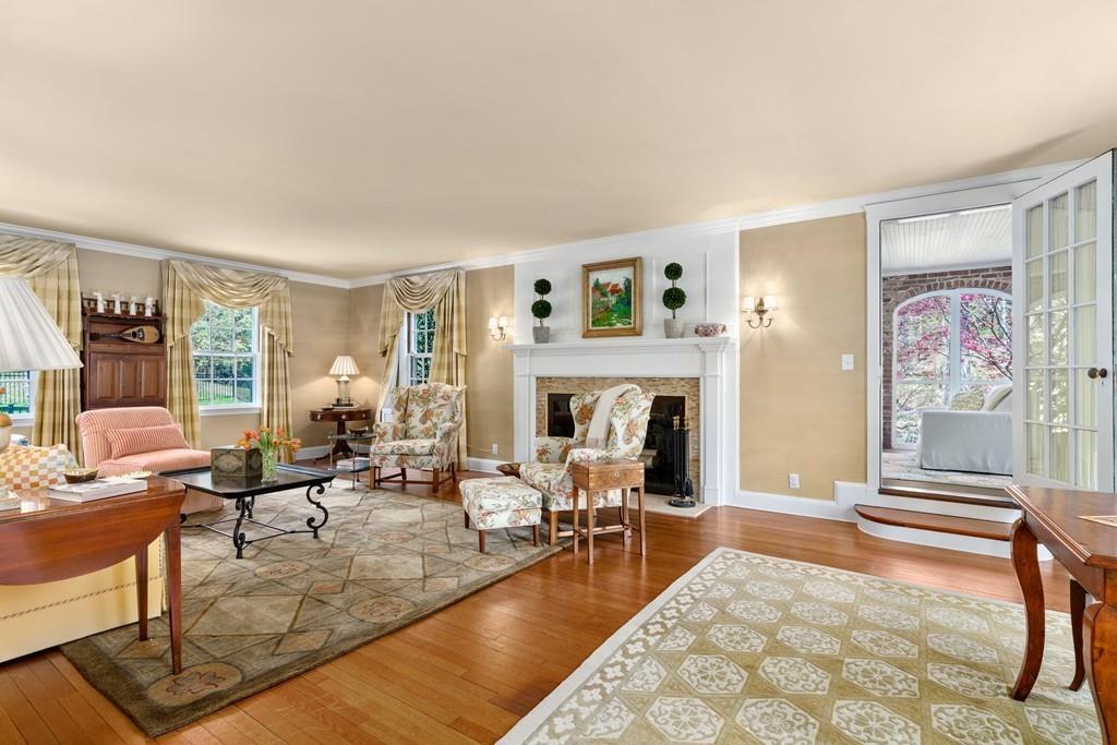 116 Meadowbrook Road Weston, MA 02493 - Photo 3 of 26 a living room with furniture or couch and a fireplace