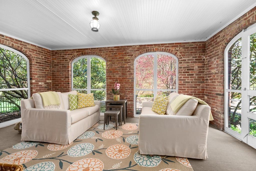 116 Meadowbrook Road Weston, MA 02493 - Photo 5 of 26 a living room with furniture and a large window
