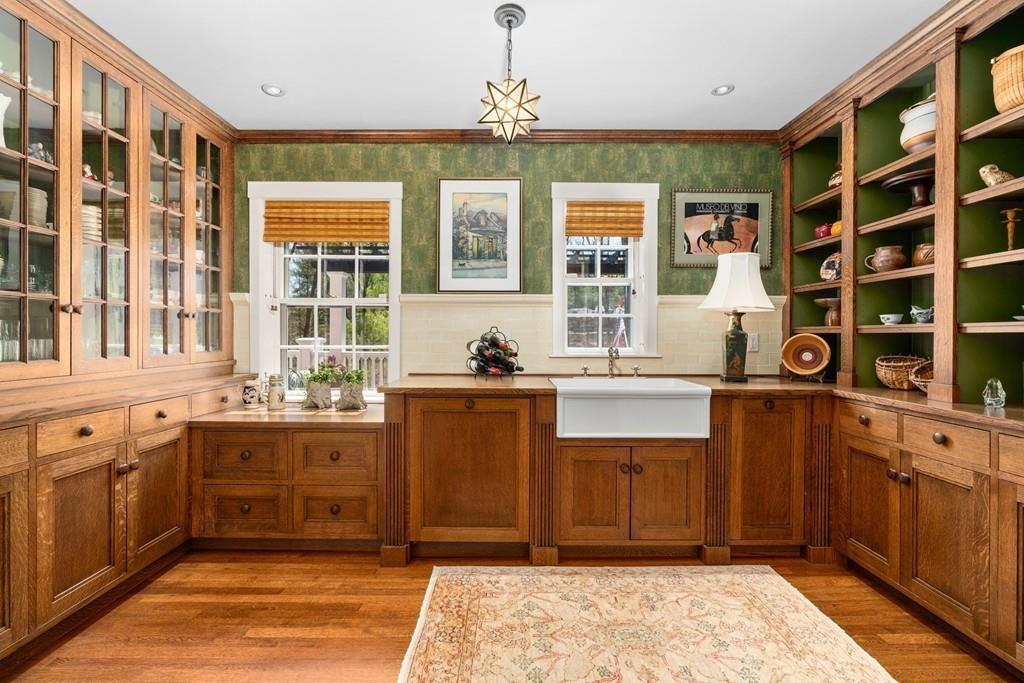 116 Meadowbrook Road Weston, MA 02493 - Photo 9 of 26 a kitchen with stainless steel appliances granite countertop a refrigerator and a stove top oven