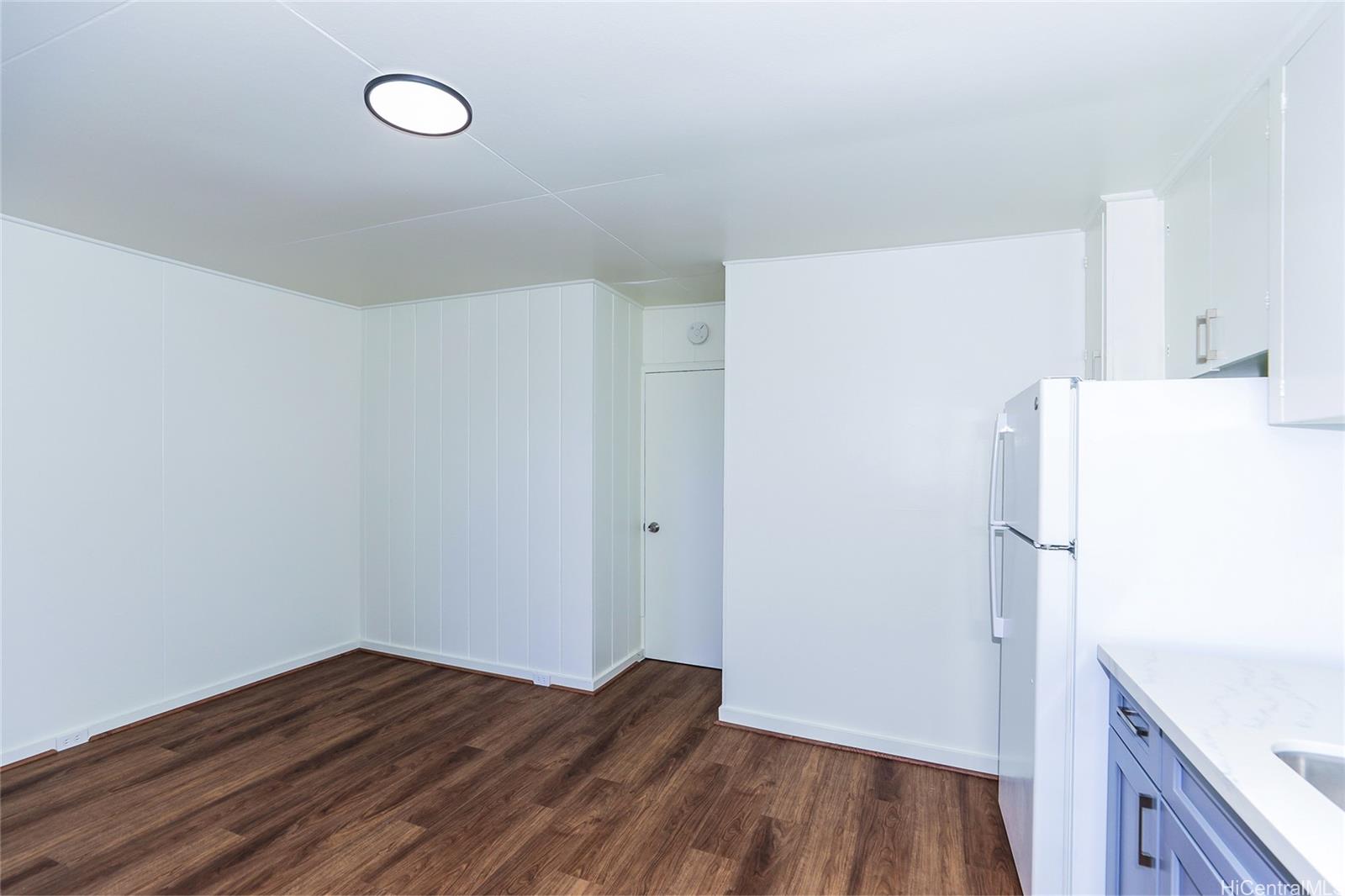 1719 Nuuanu Avenue, Unit 5F Honolulu, HI 96817 - Photo 11 of 25 a view of a room with wooden floor and sink