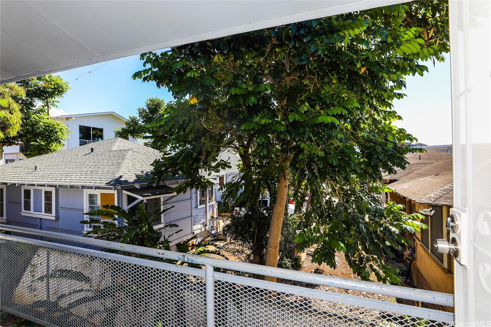 1719 Nuuanu Avenue, Unit 5F Honolulu, HI 96817 - Photo 2 of 25 view of a house with a tree