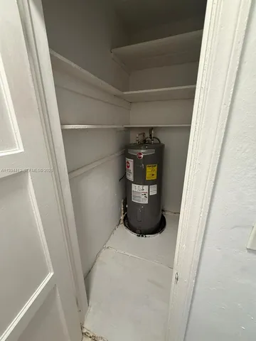 a bathroom with a toilet sink and shower