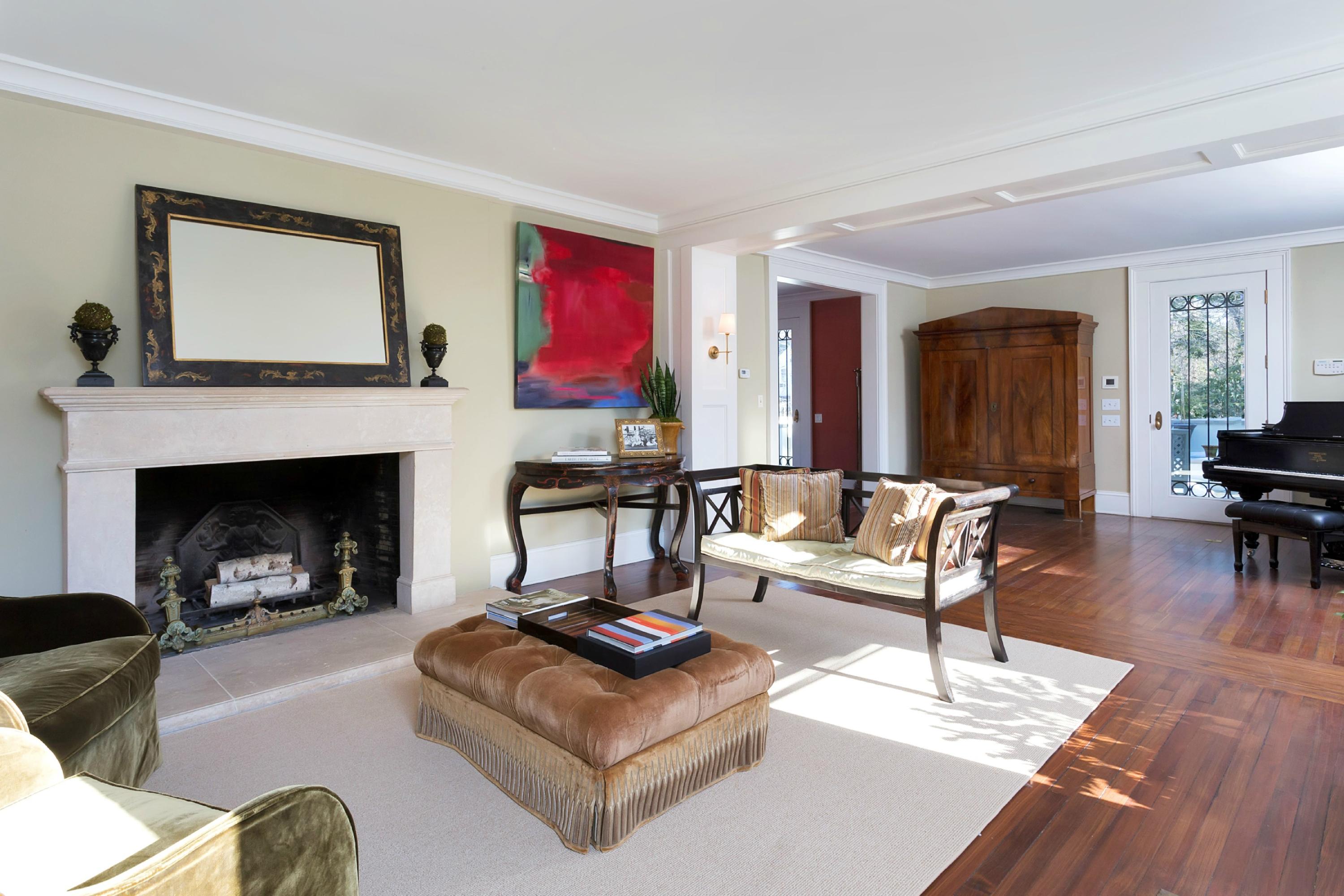 39 Old Farm Road Darien, CT 06820 - Photo 11 of 36 a living room with furniture a flat screen tv and a fireplace