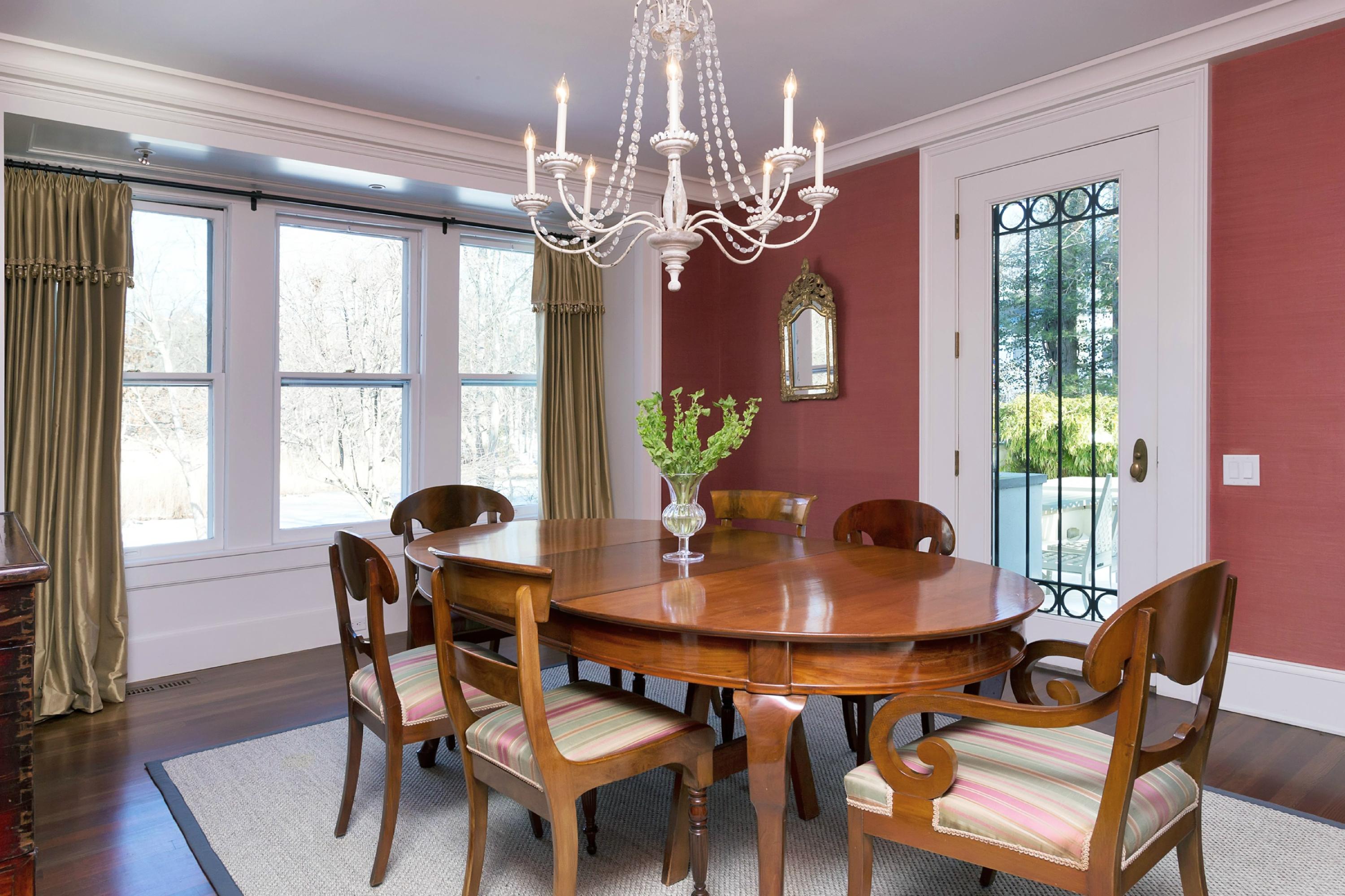 39 Old Farm Road Darien, CT 06820 - Photo 13 of 36 a view of a dining room with furniture a chandelier and wooden floor