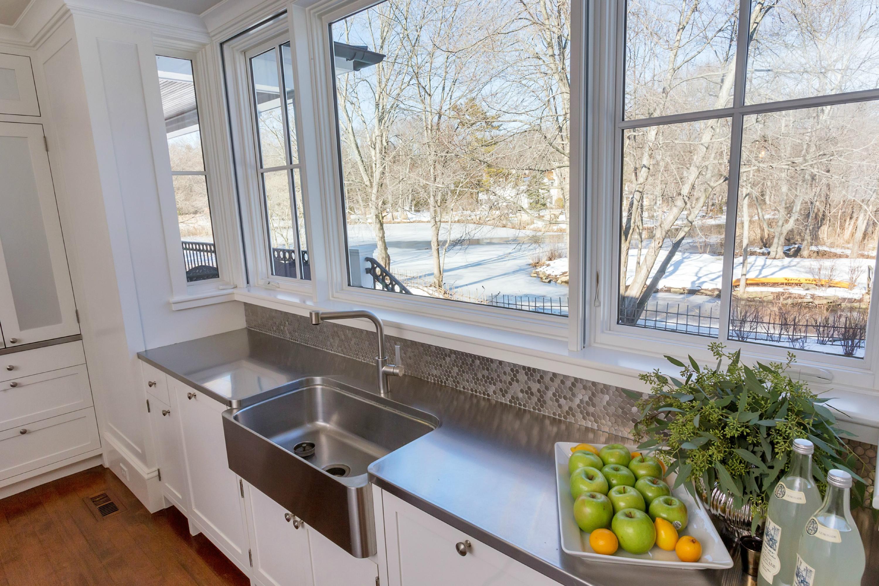39 Old Farm Road Darien, CT 06820 - Photo 16 of 36 a kitchen that has a sink and a window in it