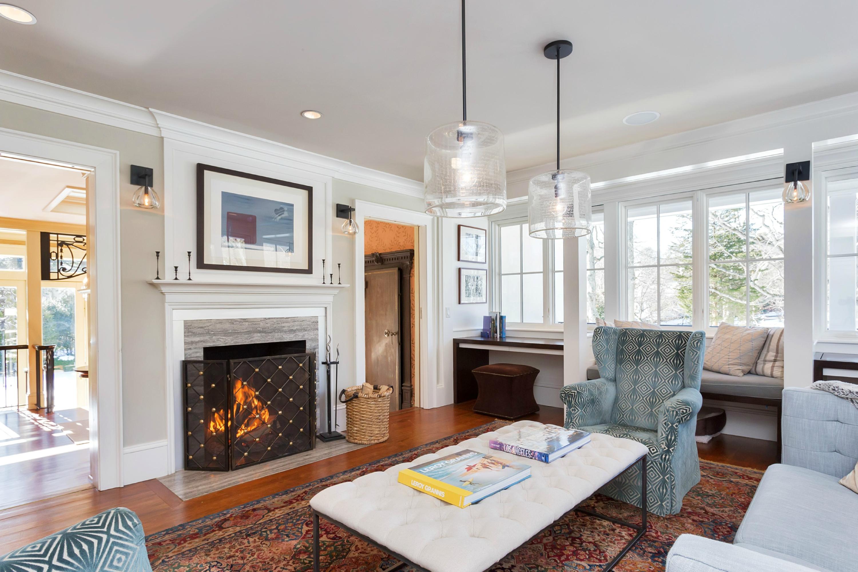 39 Old Farm Road Darien, CT 06820 - Photo 17 of 36 a living room with furniture and a fireplace